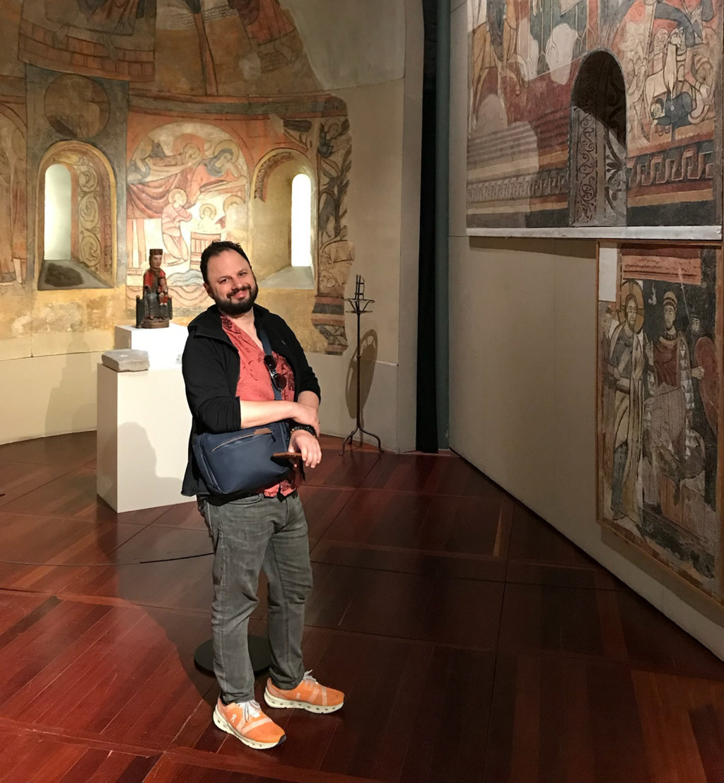 Peter russo with mountains and water in the background.